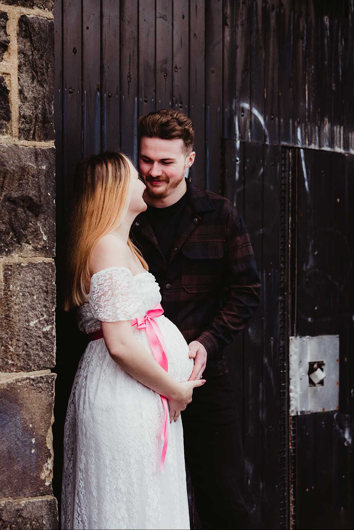 Maternity photo of a couple, studio shooting